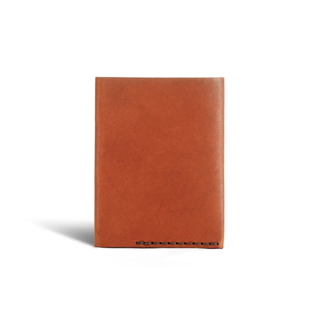 Tailfeather Sparrow style wallet in hazelnut colour, shown closed.