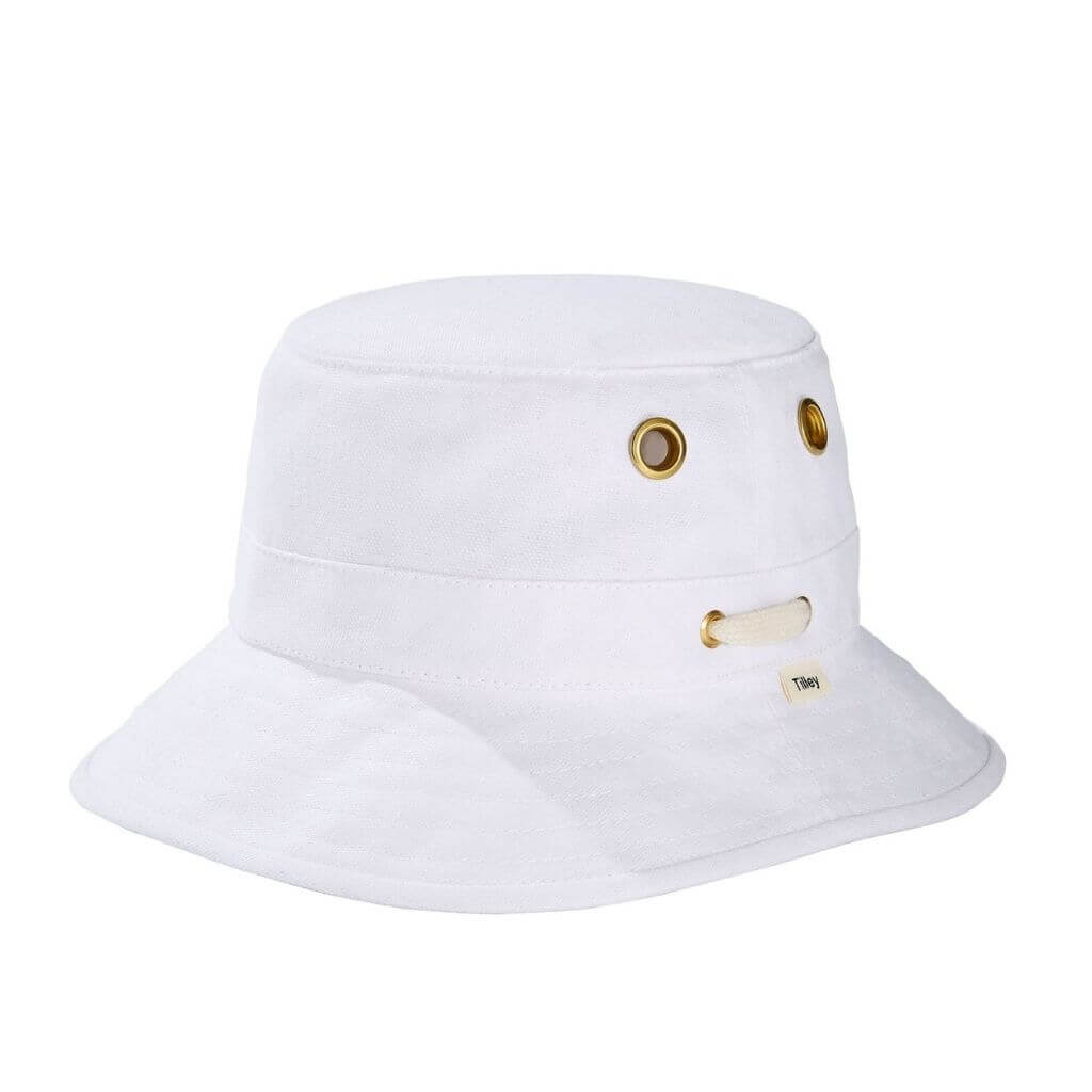 Angle view of Tilley T1 The Iconic Bucket hat in white.